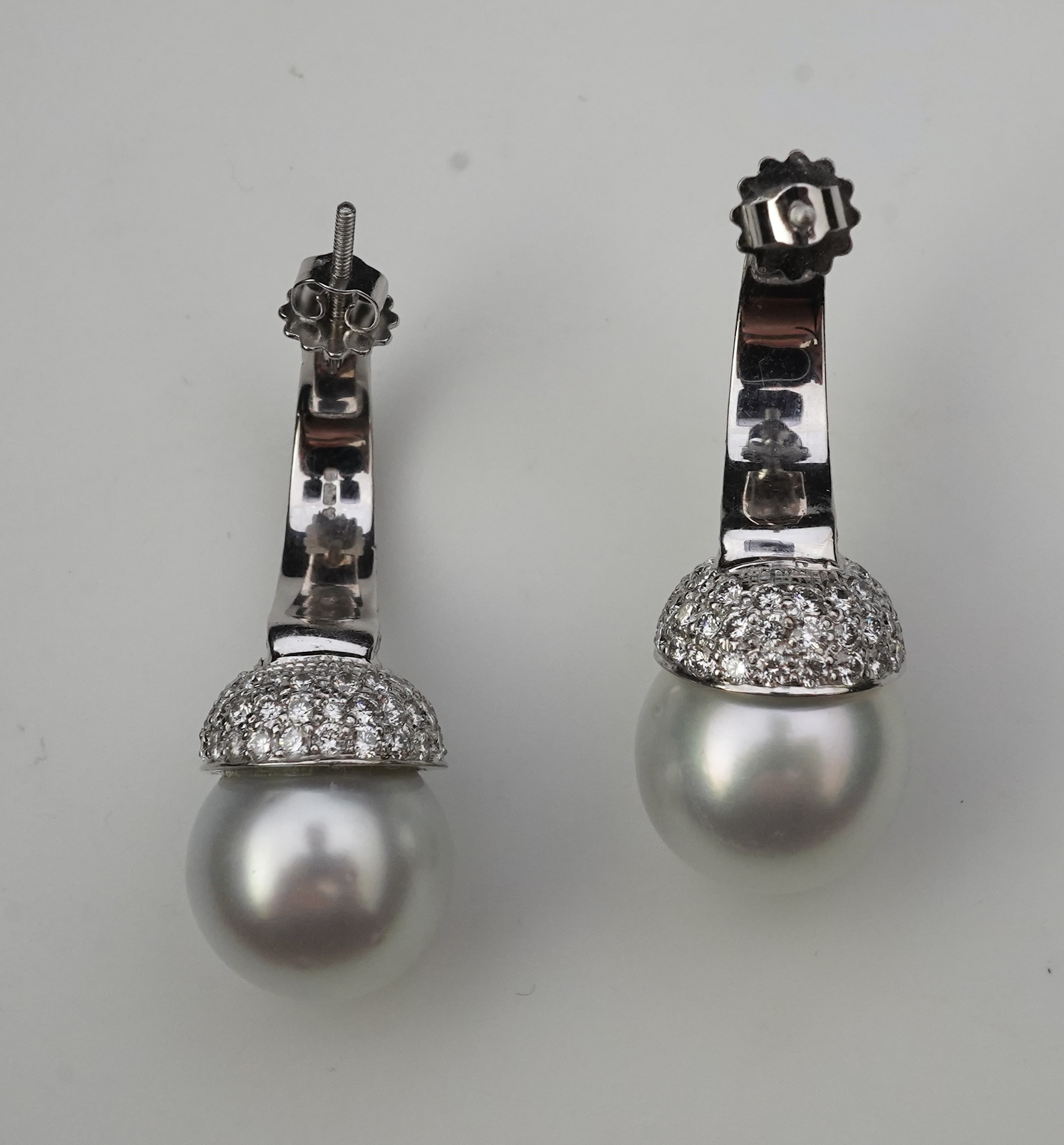 A pair of South Sea cultured pearl and diamond earrings